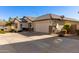 Single-story home with a two-car garage and desert landscaping at 1329 N Balboa --, Mesa, AZ 85205