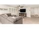 Open living room featuring a sectional sofa and built-in media cabinet at 1329 N Balboa --, Mesa, AZ 85205
