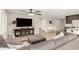 Open concept living room with sectional sofa and view to kitchen at 1329 N Balboa --, Mesa, AZ 85205