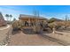 View of backyard, showing patio and landscaping at 14722 W Arzon Way, Sun City West, AZ 85375