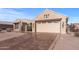 Two-car garage with light beige door and driveway at 14722 W Arzon Way, Sun City West, AZ 85375