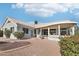 Charming backyard with covered patio and fountain at 15107 W Las Brizas Ln, Sun City West, AZ 85375