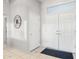 Bright entryway with double doors and tile flooring at 15107 W Las Brizas Ln, Sun City West, AZ 85375