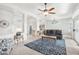 Spacious living room with access to kitchen and backyard at 15107 W Las Brizas Ln, Sun City West, AZ 85375