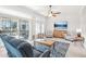 Relaxing living room featuring comfy seating and a large TV at 15107 W Las Brizas Ln, Sun City West, AZ 85375