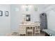 Bright vanity area with a makeup table, mirror, and ample storage at 15107 W Las Brizas Ln, Sun City West, AZ 85375