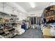 Large walk-in closet with ample shelving and hanging space at 15107 W Las Brizas Ln, Sun City West, AZ 85375
