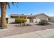 Charming single-story home with desert landscaping, red tile roof, and inviting curb appeal at 1737 Leisure World St # 1737, Mesa, AZ 85206