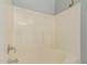 Clean bathroom with a tub and shower at 18741 N Vemto St, Maricopa, AZ 85138