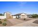 A detached garage and driveway offer ample parking space at 19788 E Cattle Dr, Queen Creek, AZ 85142