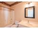 Clean bathroom with tub, toilet and vanity at 19810 N 90Th Ln, Peoria, AZ 85382