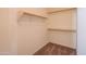 Spacious closet with ample shelving and hanging space at 19810 N 90Th Ln, Peoria, AZ 85382