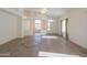 Spacious living room with tile floors and high ceilings at 19810 N 90Th Ln, Peoria, AZ 85382