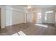 Spacious living area with tile flooring and entryway view at 19810 N 90Th Ln, Peoria, AZ 85382