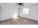 Bright bedroom with a window and ceiling fan at 2058 N 64Th Dr, Phoenix, AZ 85035