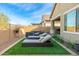Relaxing backyard oasis with artificial turf and lounge chairs at 21062 E Via Del Sol --, Queen Creek, AZ 85142