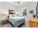 Cozy bedroom with ceiling fan and window at 21062 E Via Del Sol --, Queen Creek, AZ 85142