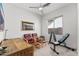 Home office featuring two chairs, a desk, and weights at 21062 E Via Del Sol --, Queen Creek, AZ 85142