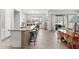 Open kitchen with granite countertops and island seating at 21062 E Via Del Sol --, Queen Creek, AZ 85142