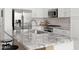 Island kitchen with granite countertops and stainless steel appliances at 21062 E Via Del Sol --, Queen Creek, AZ 85142