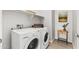 Laundry room with washer, dryer, and shelving at 21062 E Via Del Sol --, Queen Creek, AZ 85142