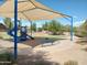 Community playground with shade structure at 21062 E Via Del Sol --, Queen Creek, AZ 85142