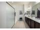 Primary bathroom with double vanity and separate shower at 3222 S 186Th Ln, Goodyear, AZ 85338