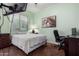 Guest bedroom with a double bed and a desk area at 3222 S 186Th Ln, Goodyear, AZ 85338