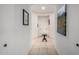 Light and airy entryway with tile flooring and a small round table at 3222 S 186Th Ln, Goodyear, AZ 85338