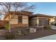 One-story home with a two-car garage and desert landscaping at 3222 S 186Th Ln, Goodyear, AZ 85338