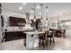 Open kitchen with island, granite countertops, and stainless steel appliances at 3222 S 186Th Ln, Goodyear, AZ 85338