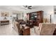Comfortable living room with a large entertainment center and plush seating at 3222 S 186Th Ln, Goodyear, AZ 85338