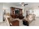 Living room with a large entertainment center and comfortable seating at 3222 S 186Th Ln, Goodyear, AZ 85338