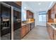 Modern kitchen features stainless steel appliances and wood cabinets at 3801 N Goldwater Blvd # 204, Scottsdale, AZ 85251