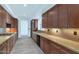 Well-equipped kitchen with wood cabinets and granite countertops at 3801 N Goldwater Blvd # 204, Scottsdale, AZ 85251