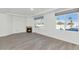 Bright living room with hardwood floors, fireplace and city views at 3801 N Goldwater Blvd # 204, Scottsdale, AZ 85251