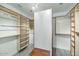 Large walk-in closet with ample shelving and hanging space at 3801 N Goldwater Blvd # 204, Scottsdale, AZ 85251