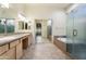 Double vanity bathroom with soaking tub and walk-in shower at 3830 E Carter Dr, Phoenix, AZ 85042