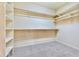 Large walk-in closet with ample shelving and hanging space at 3830 E Carter Dr, Phoenix, AZ 85042