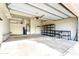 Spacious garage with built-in shelving and storage at 3830 E Carter Dr, Phoenix, AZ 85042