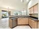 Kitchen with breakfast bar and stainless steel appliances at 3830 E Carter Dr, Phoenix, AZ 85042