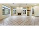 Living room with fireplace and built-in shelving at 3830 E Carter Dr, Phoenix, AZ 85042