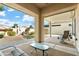 Relaxing covered patio with seating area and view of the backyard at 3830 E Carter Dr, Phoenix, AZ 85042