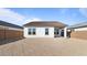 Spacious backyard with a covered patio and large lot at 3873 S 233Rd Ln, Buckeye, AZ 85326