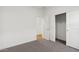 Spacious bedroom with wall-to-wall carpet and a large closet at 3873 S 233Rd Ln, Buckeye, AZ 85326