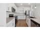 Modern kitchen with stainless steel appliances and an island at 3873 S 233Rd Ln, Buckeye, AZ 85326