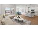 Open concept living area with kitchen and dining area at 3873 S 233Rd Ln, Buckeye, AZ 85326
