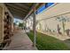 Covered patio and grassy backyard with a pergola at 4135 N 17Th St # 8, Phoenix, AZ 85016
