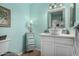 Bathroom with white vanity, updated fixtures and a large mirror at 4135 N 17Th St # 8, Phoenix, AZ 85016