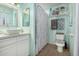 Updated bathroom features a white vanity, updated fixtures, and a tiled shower/tub at 4135 N 17Th St # 8, Phoenix, AZ 85016